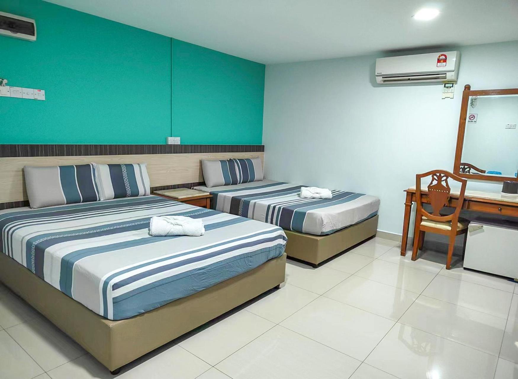 G Star Hotel Pantai Remis Extérieur photo
