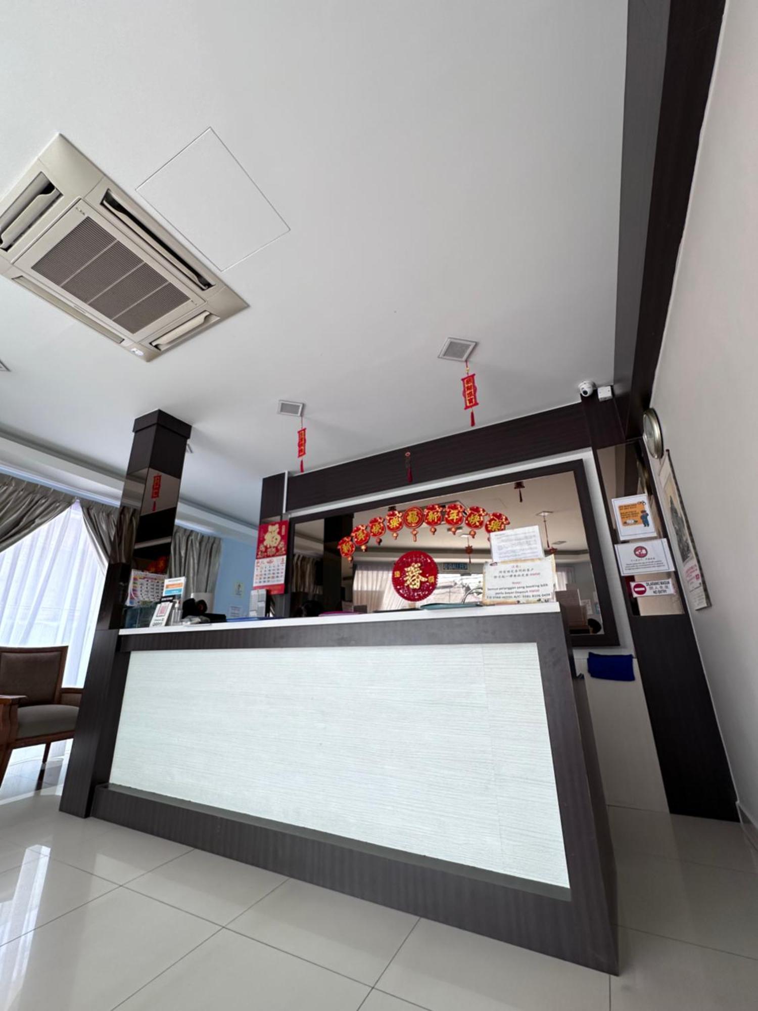 G Star Hotel Pantai Remis Extérieur photo